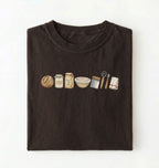 Flat lay of a brown sourdough baking essentials shirt with starter flour dough bowl and bread making tools on a white background 