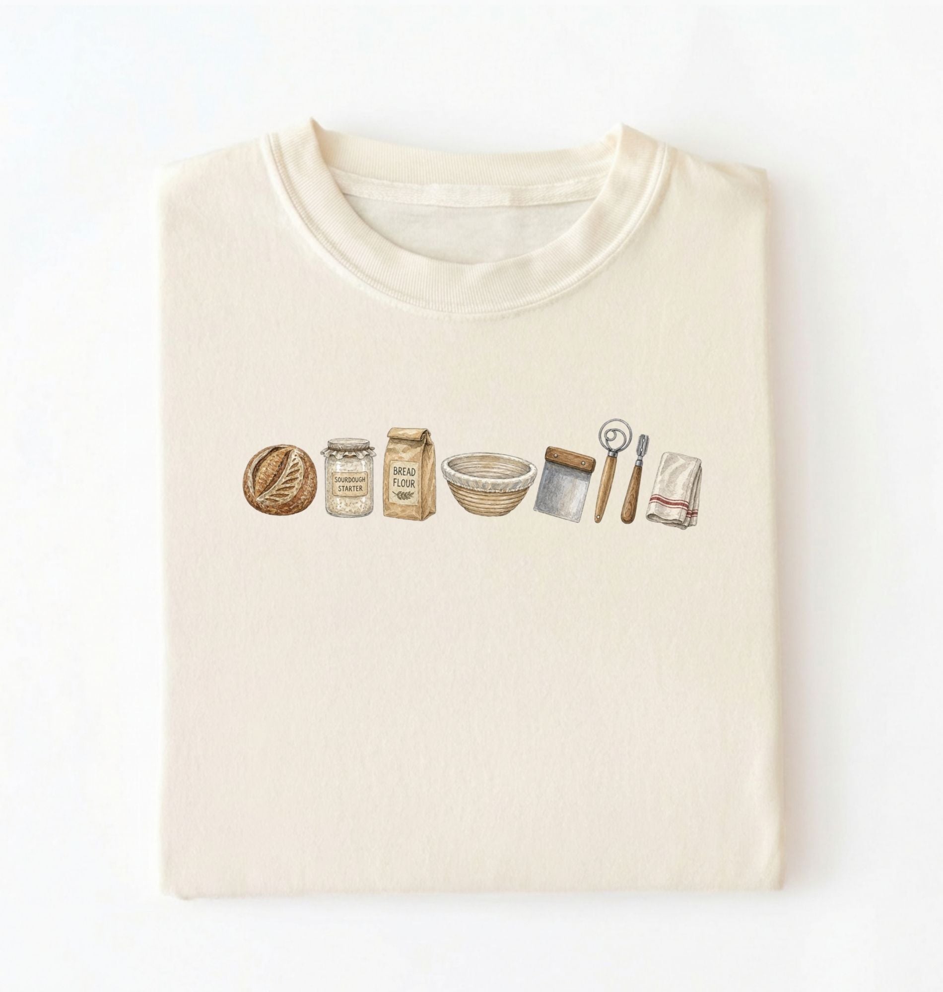 Flat lay of a ivory sourdough baking essentials shirt with starter flour dough bowl and bread making tools on a white background 