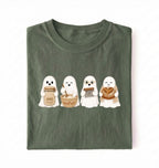 Flat lay of a Moss green sourdough shirt featuring four cute baking ghosts with a starter jar, mixing bowl, bench scraper and bread loaf on a white background 