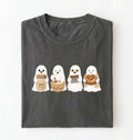 Flat lay of a dark gray sourdough shirt featuring four cute baking ghosts with a starter jar, mixing bowl, bench scraper and bread loaf on a white background 