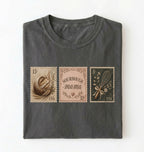 Flat lay of a pepper sourdough mama shirt brown vintage baking stamps t shirt bread lover gift cozy kitchen design on a white background