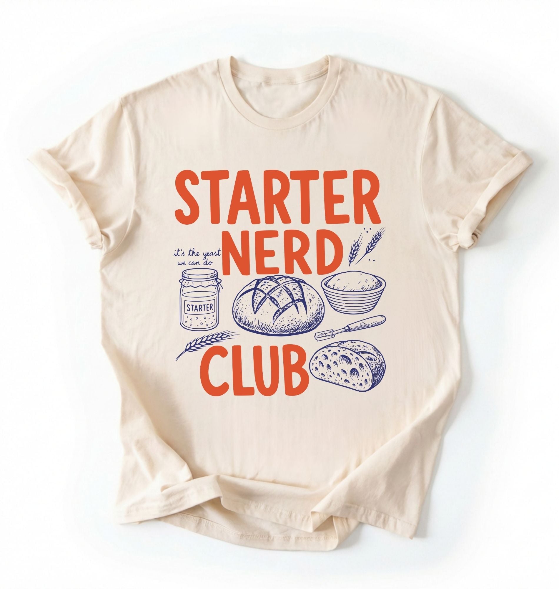 Flat lay of a cream starter nerd club shirt with sourdough starter jar bread and baking illustrations funny baker gift on a white background 