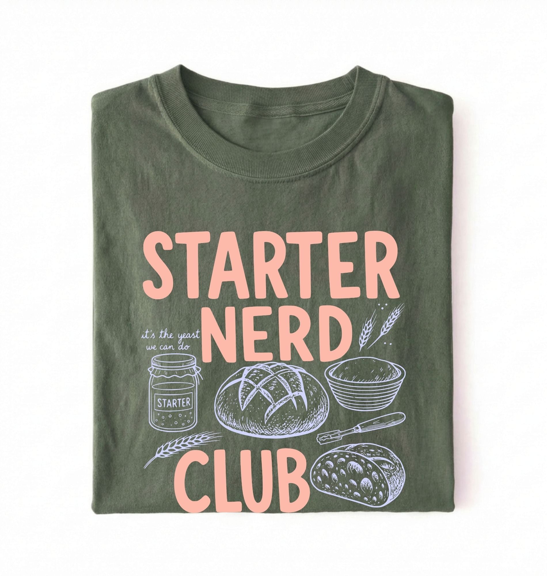 Flat lay of a green starter nerd club shirt with sourdough starter jar bread and baking illustrations funny baker gift on a white background 