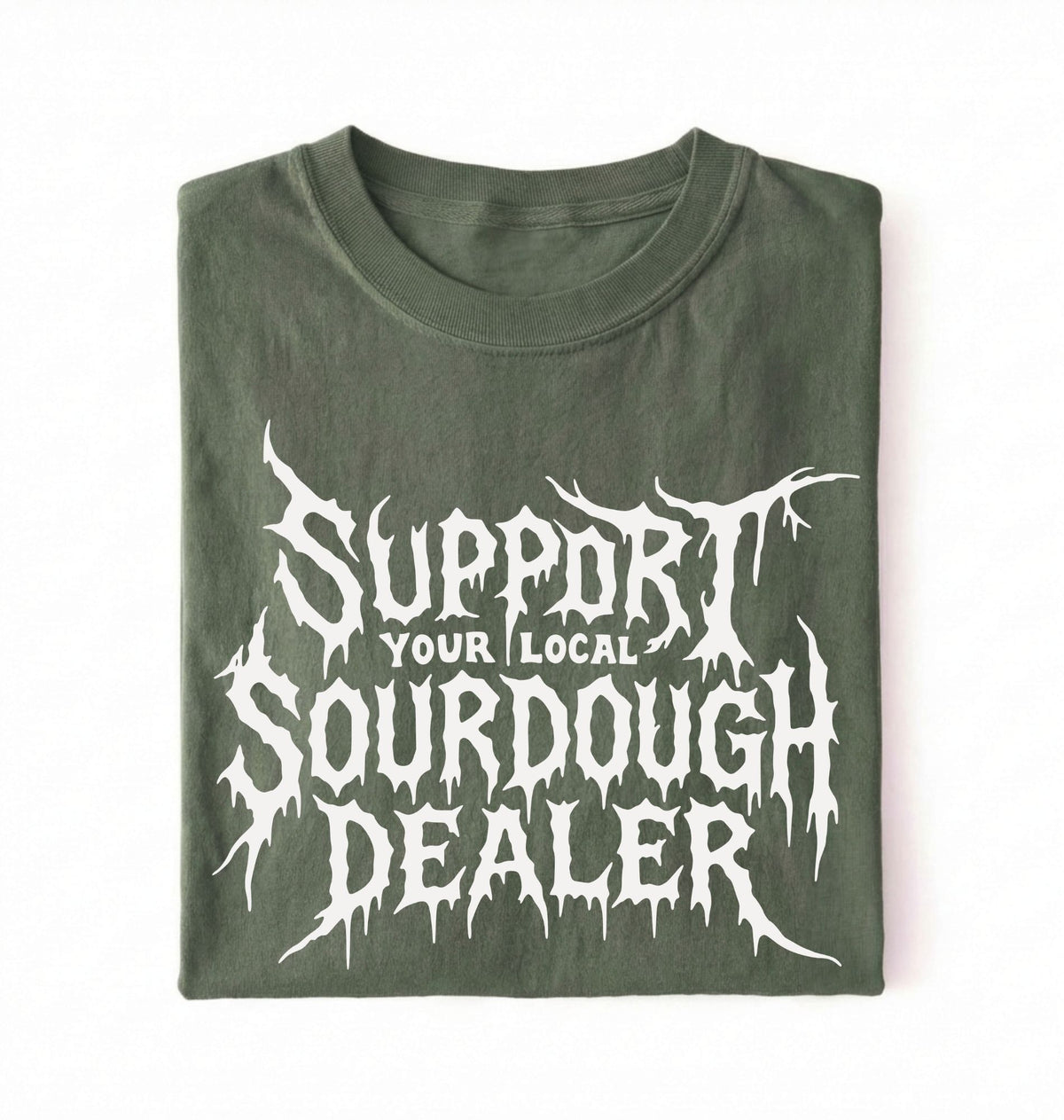 A folded dark olive green t-shirt with a white graphic print that reads 'SUPPORT YOUR LOCAL SOURDOUGH DEALER' in a stylized, dripping font, displayed against a plain white background.