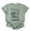 flat lay of a sage green shirt with a text that says "that's it you're going in the compost"