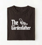 Flat lay of a the gardenfather shirt brown funny gardening dad t shirt plant lover gift on a pepper background 