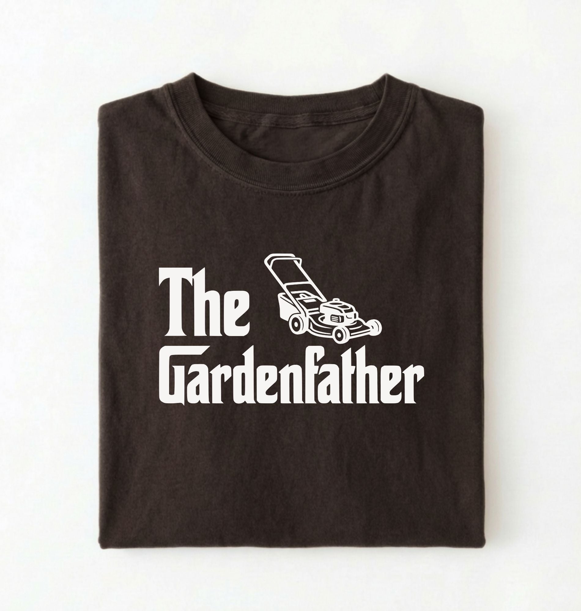 Flat lay of a the gardenfather shirt brown funny gardening dad t shirt plant lover gift on a pepper background 