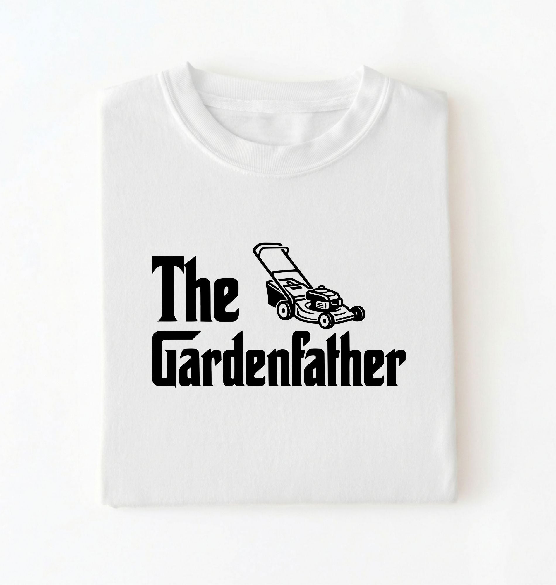 Flat lay of a the gardenfather shirt white funny gardening dad t shirt plant lover gift on a white background 