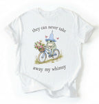 Flat lay of a white Cute whimsical frog shirt for nature and cottagecore fashion lovers on a white background 