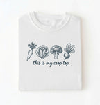 Flat lay of a white this is my crop top shirt brown funny gardening t shirt vegetable lover cottagecore gift on a white background 