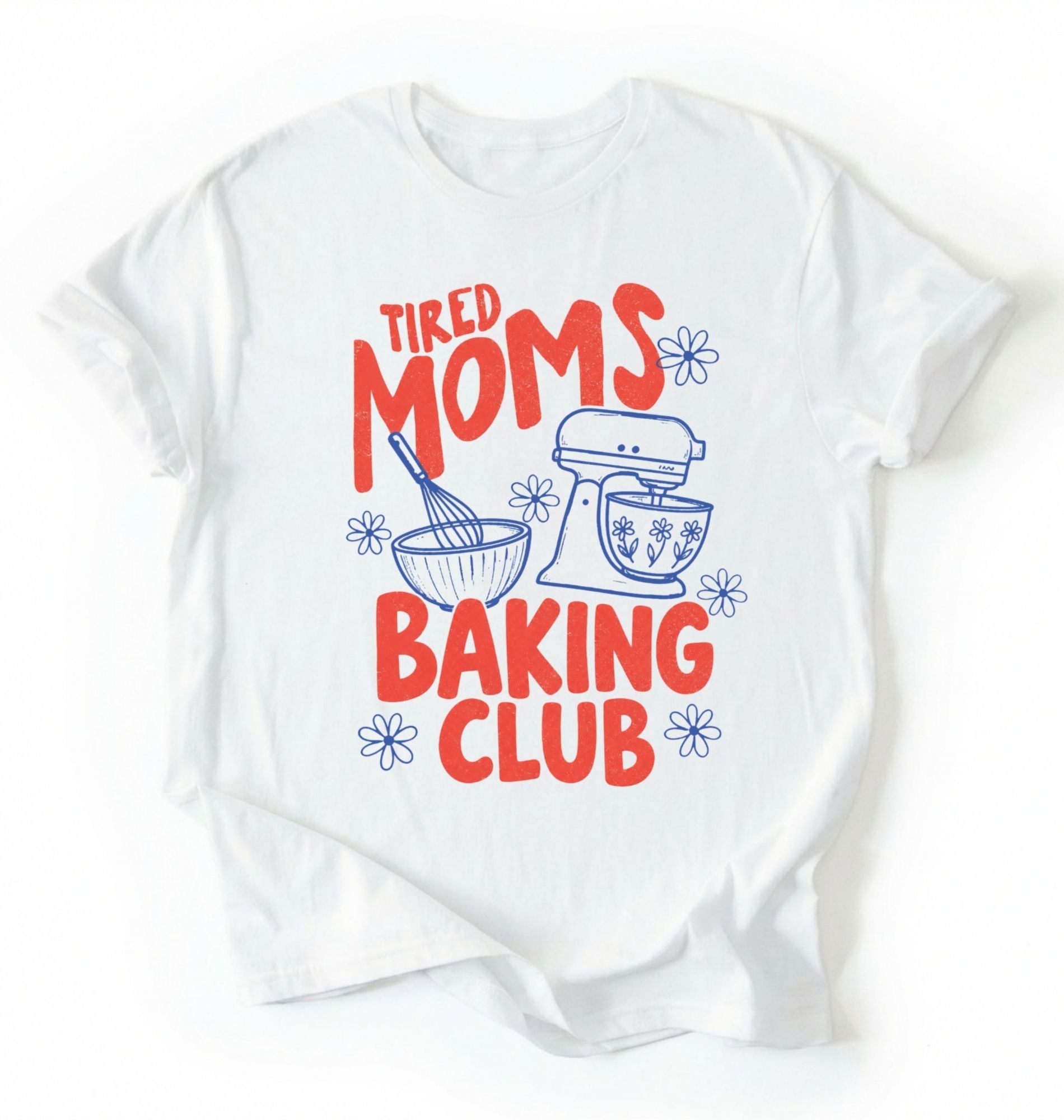 Flat lay of a white tired moms baking club shirt white funny mom baker t shirt cozy kitchen baking gift design on a white background 