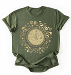 Flat lay of a green tree rings shirt with forest and botanical design brown aesthetic nature lover gift t-shirt on a white background 