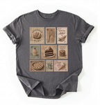 Flat lay of a charcoal vintage baking stamps shirt white sourdough bread t shirt baker gift cozy kitchen aesthetic design on a white background 
