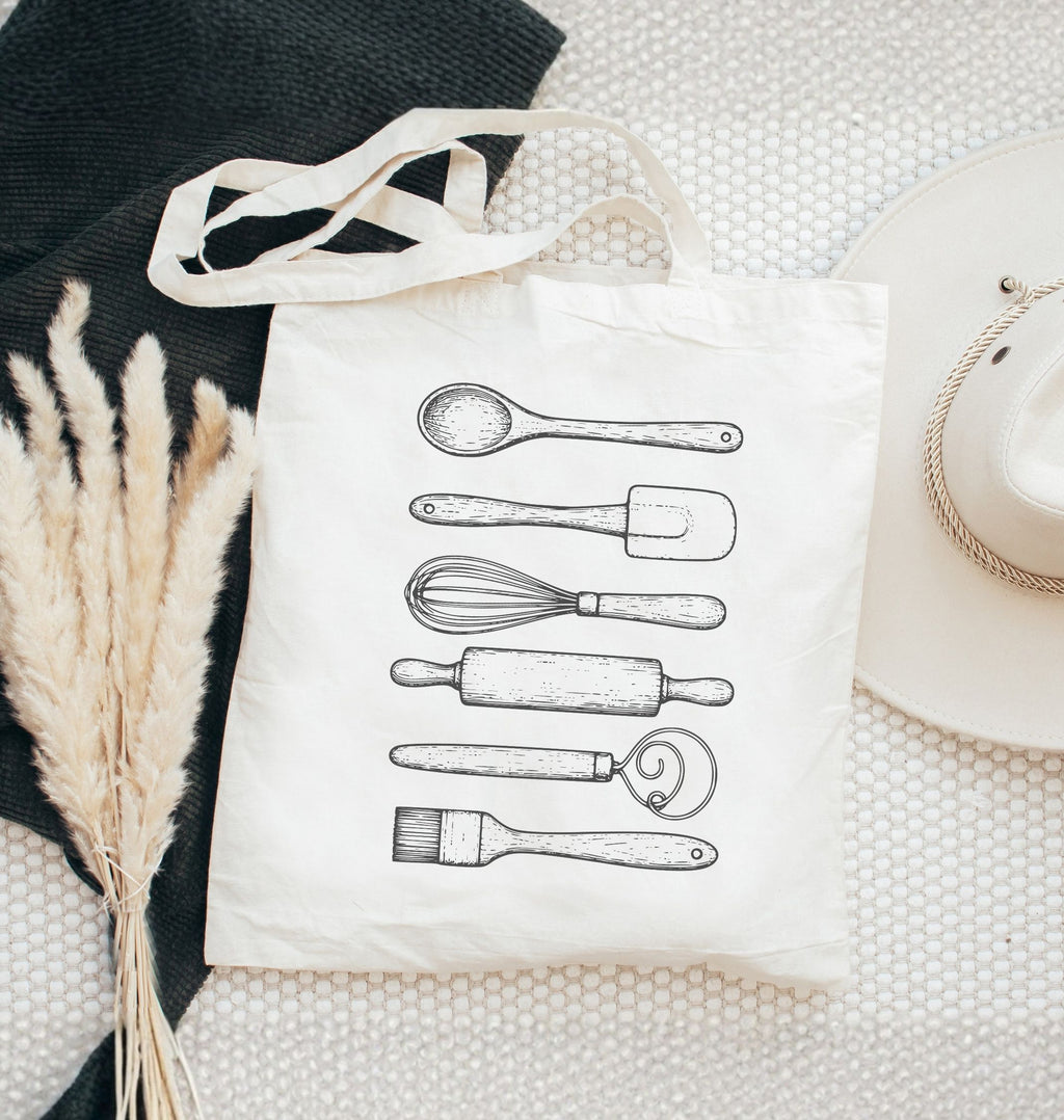 Reusable canvas tote bag for bakers with rolling pin and whisk artwork