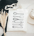 Reusable canvas tote bag for bakers with rolling pin and whisk artwork