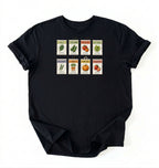 Flat lay of a black vintage seed packet garden shirt with heirloom vegetable and herb illustrations gardener gift on a white background