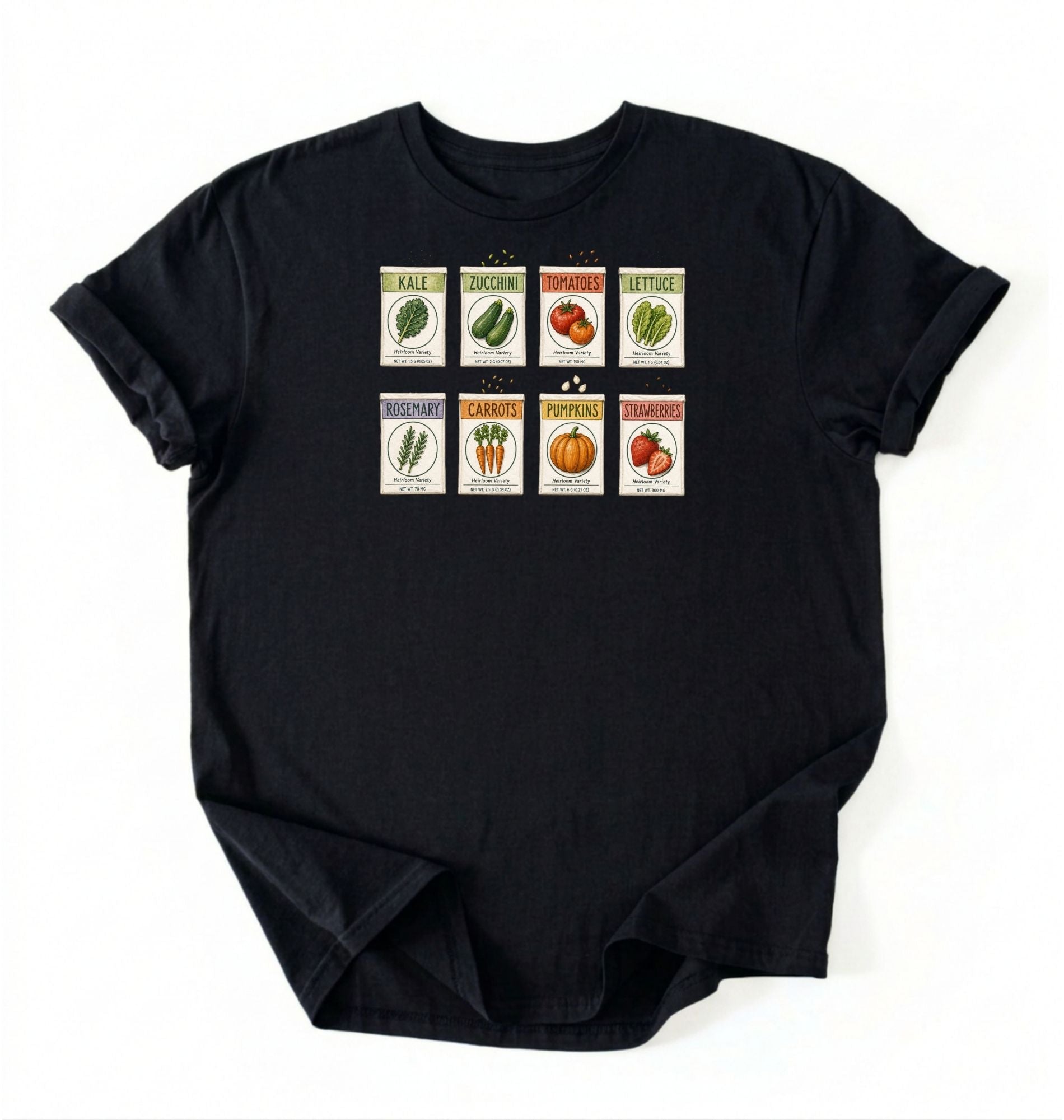 Flat lay of a black vintage seed packet garden shirt with heirloom vegetable and herb illustrations gardener gift on a white background