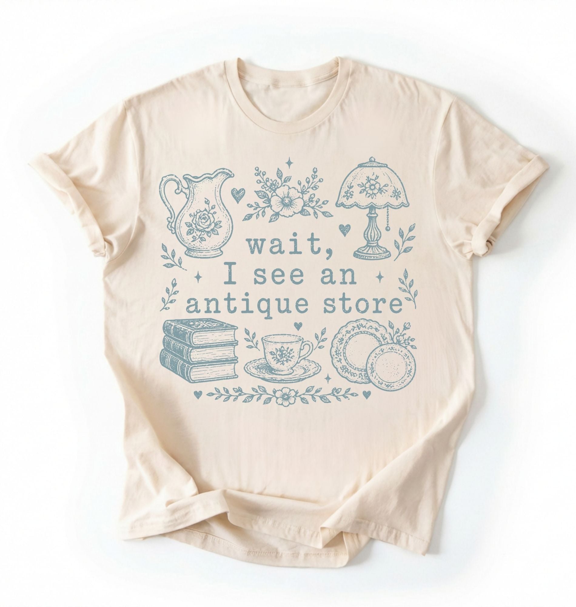 Flat lay of an ivory wait i see an antique store shirt funny vintage thrift aesthetic gift on a white background 