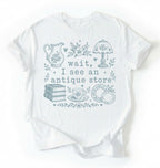 Flat lay of a white wait i see an antique store shirt funny vintage thrift aesthetic gift on a white background 