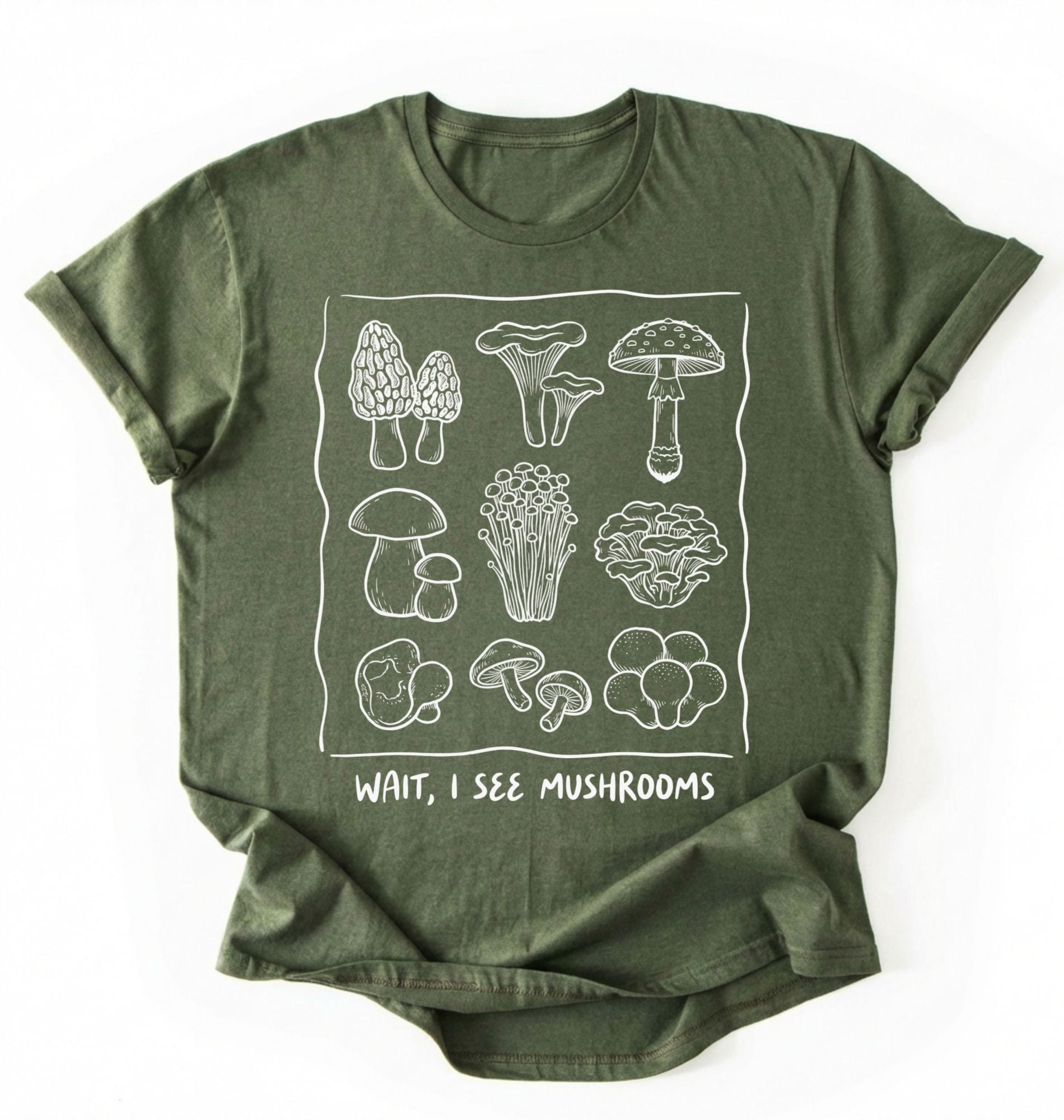 Flat lay of a Green t-shirt with white mushroom illustrations and text on a white background on a white background 