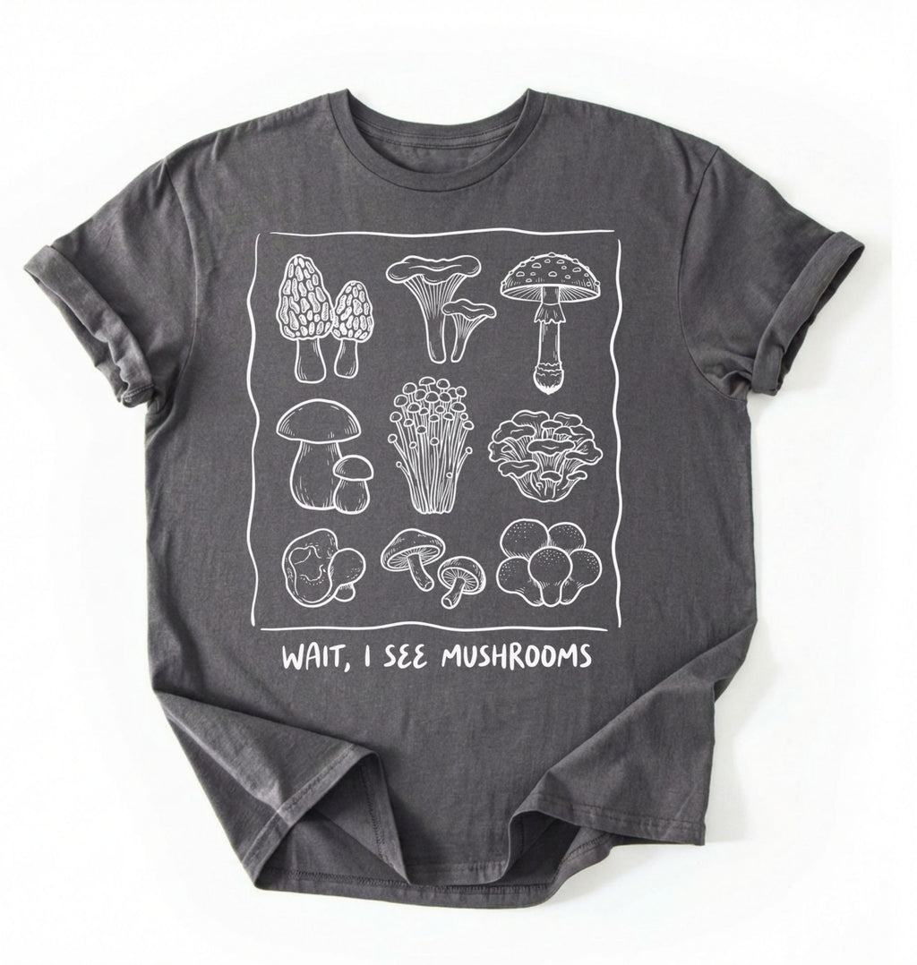 Flat lay of a Gray t-shirt with white mushroom illustrations and text on a white background