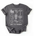Flat lay of a Gray t-shirt with white mushroom illustrations and text on a white background