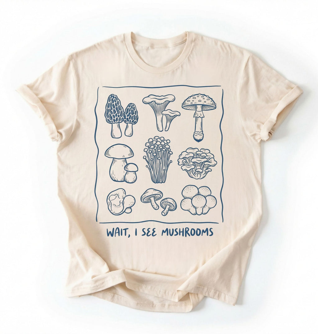 Flat lay of a Brown t-shirt with white mushroom illustrations and text on a white background on a white background 