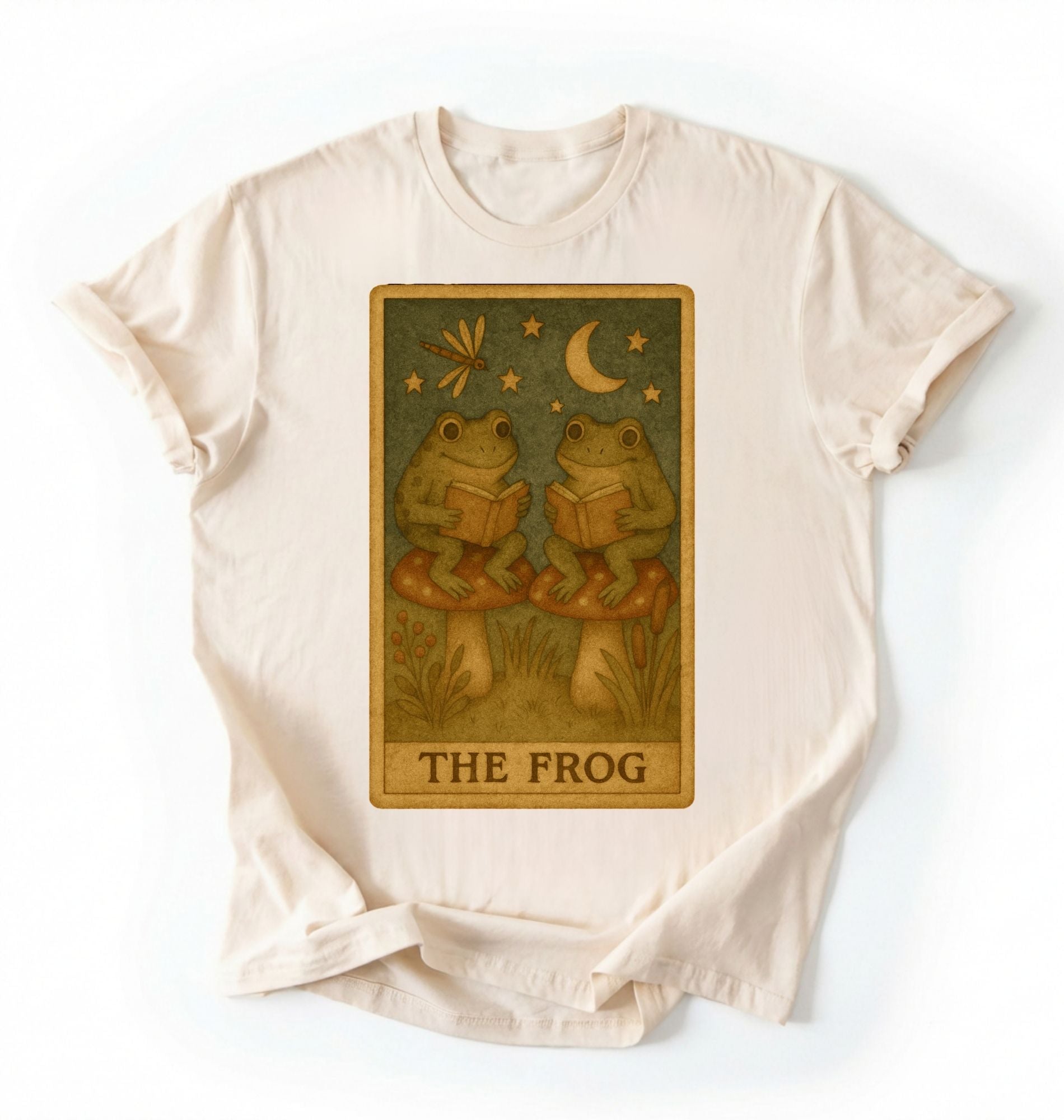 flat lay of a Natural cozy frog reading shirt perfect for book lovers and nature fans on a white background 