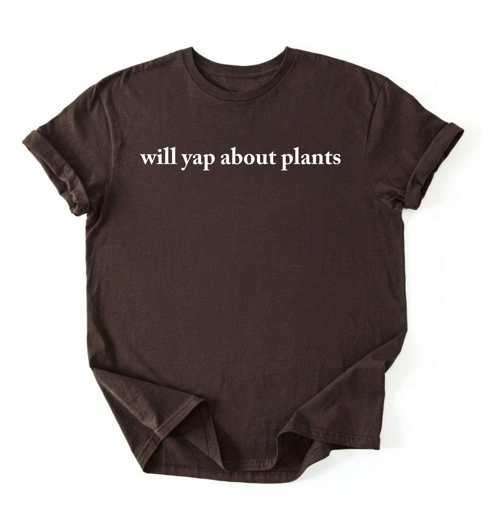 Flat lay of a espresso cozy crewneck t-shirt on a white background with text reading “Will yap about plants centered on the front 
