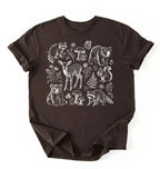 Flat lay of a woodland animals shirt brown cottagecore forest animal t shirt mushroom nature gift on a white background 