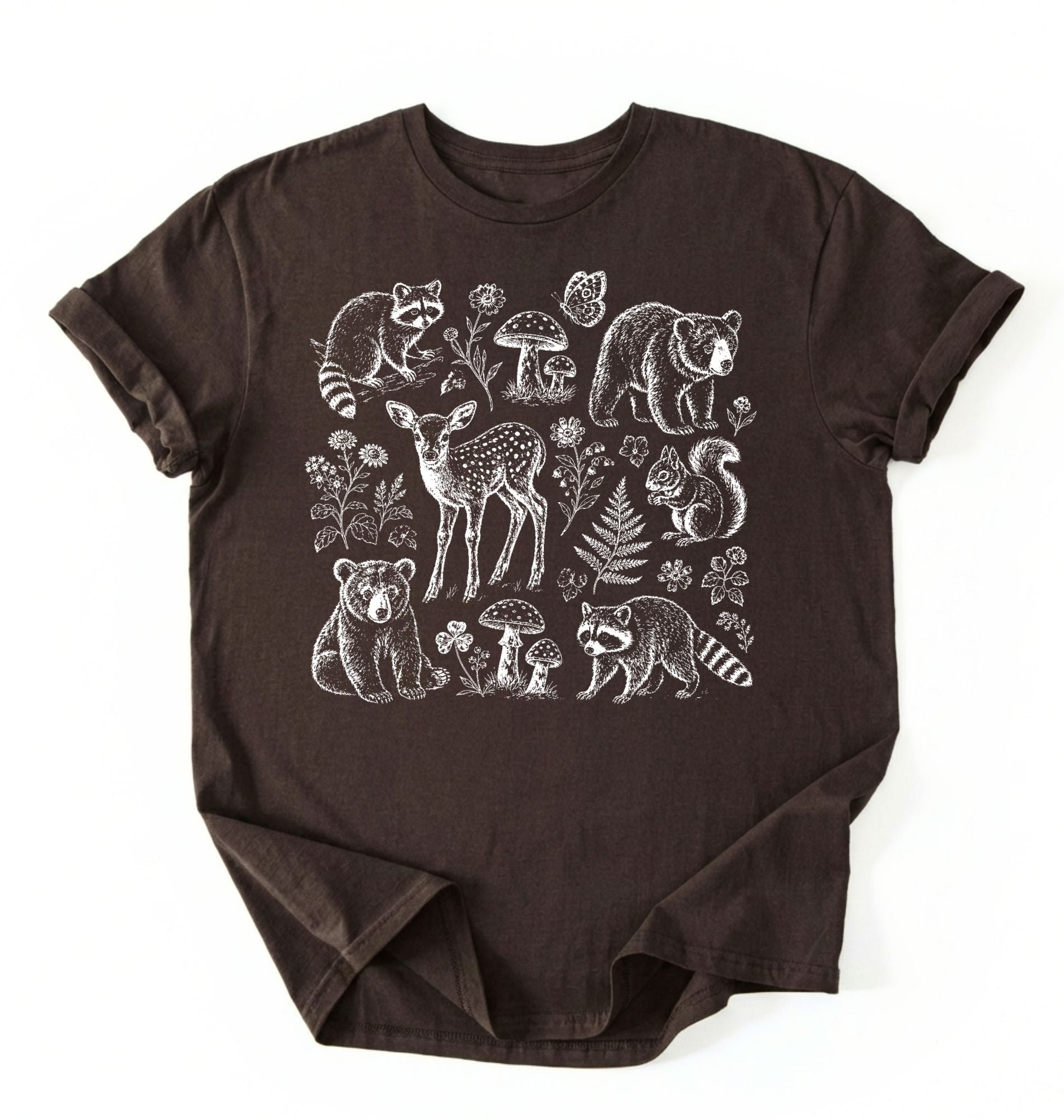Flat lay of a woodland animals shirt brown cottagecore forest animal t shirt mushroom nature gift on a white background 